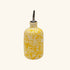 Oil Bottle Butter - Yellow and white speckled ceramic oil bottle on a white background - LAMP LDN LIVING