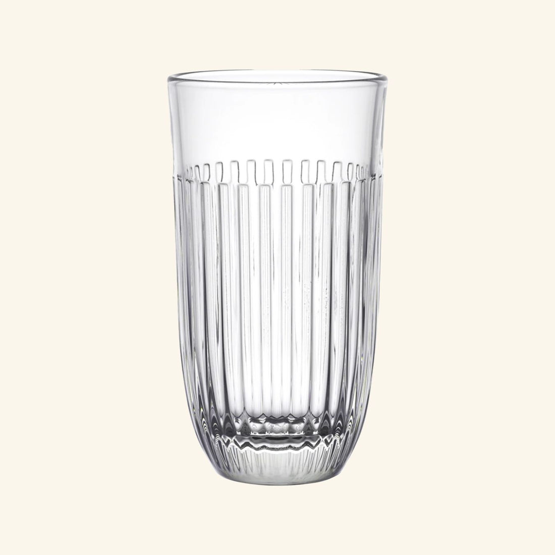 A clear glass with embossed vertical lines.