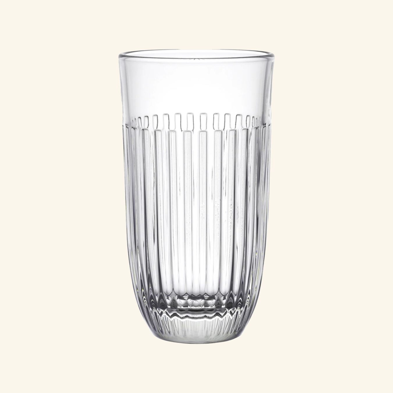 A clear glass with embossed vertical lines.